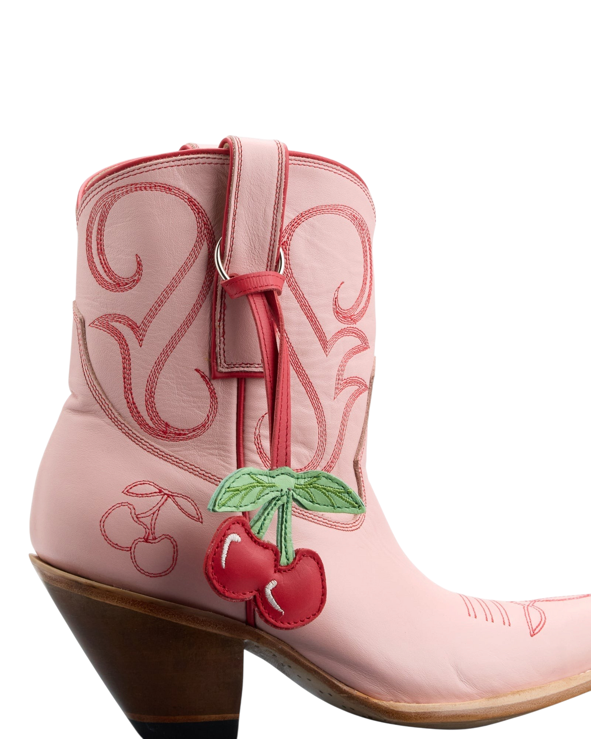 Old Gringo Boots pink cowhide leather western ankle boot with red contrast stitching and a cherry charm detail.