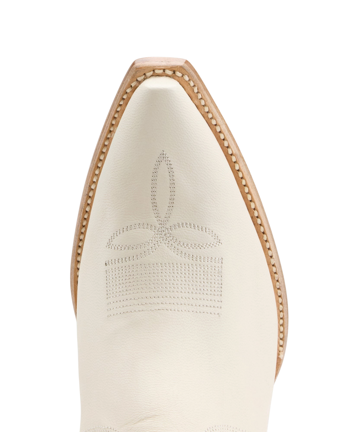 Old Gringo Boots white goat leather cowboy boot featuring a 4Long pointed toe with intricate decorative stitching.