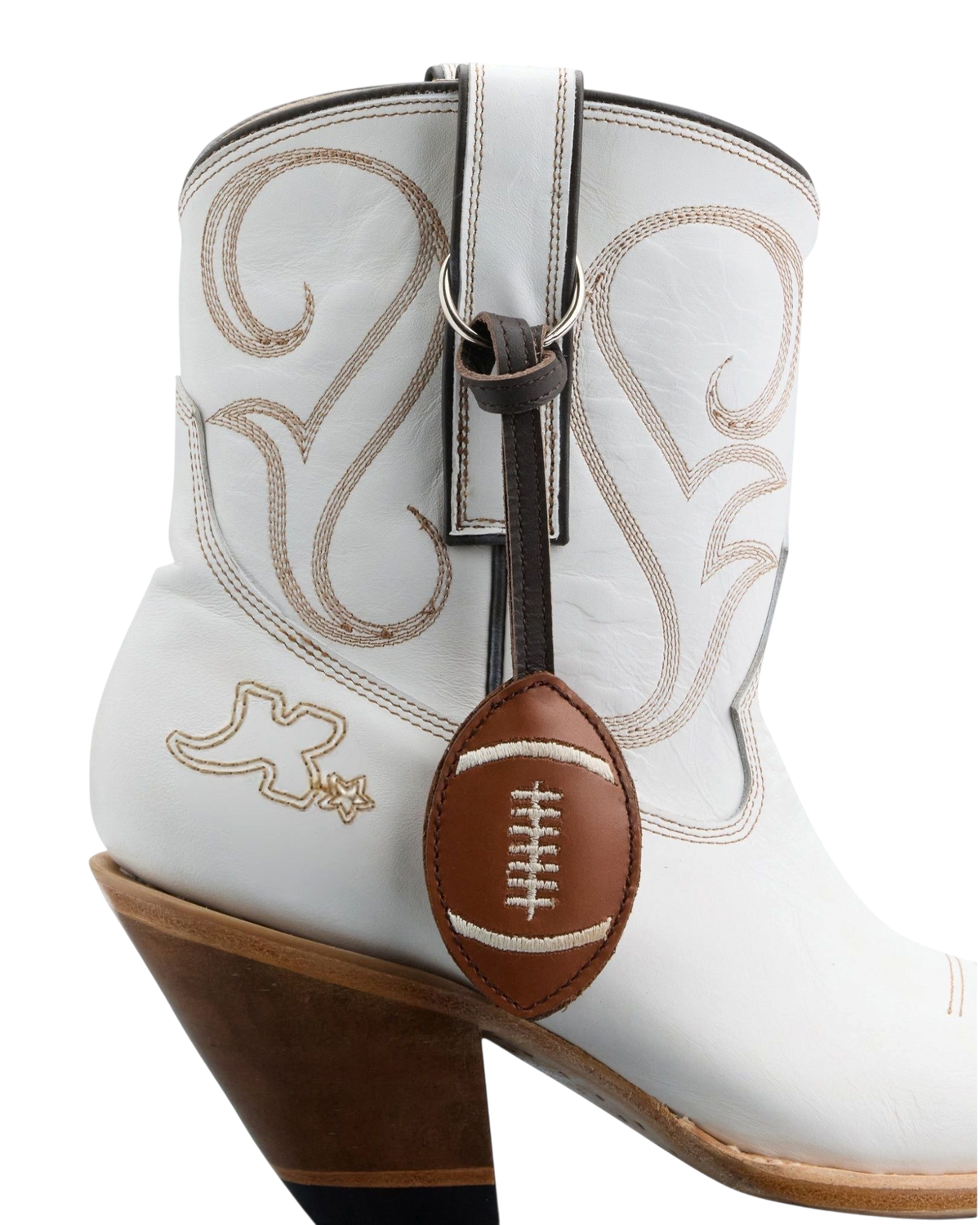 Old Gringo Boots white cowhide leather ankle boot with contrast stitching and a brown football pigskin bauble charm.
